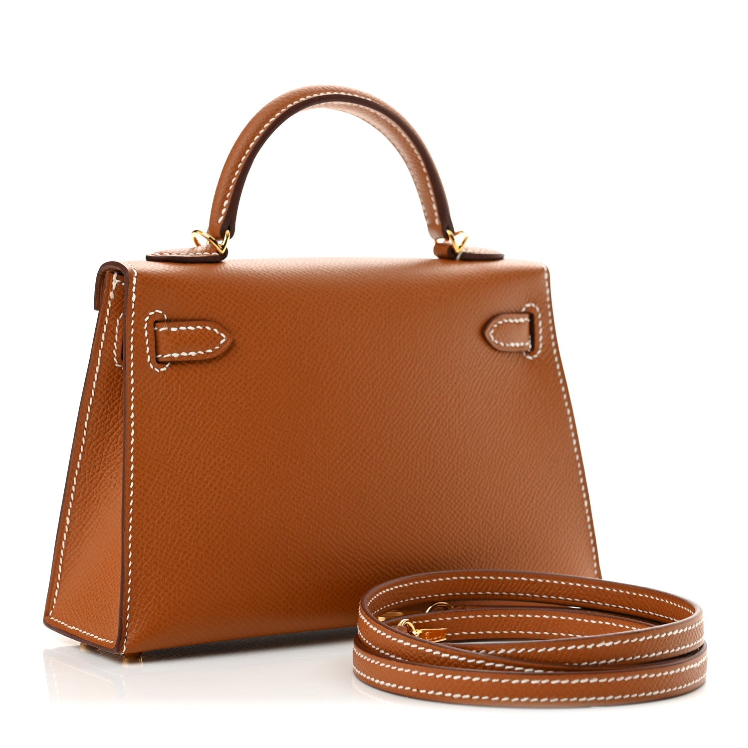 Back three-quarter view of a Gold Epsom Hermès Mini Kelly II with its detachable leather shoulder strap
