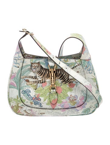 Piston Lock Crossbody Bag