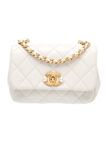 CC Quilted Mini Pearl Side Flap Bag